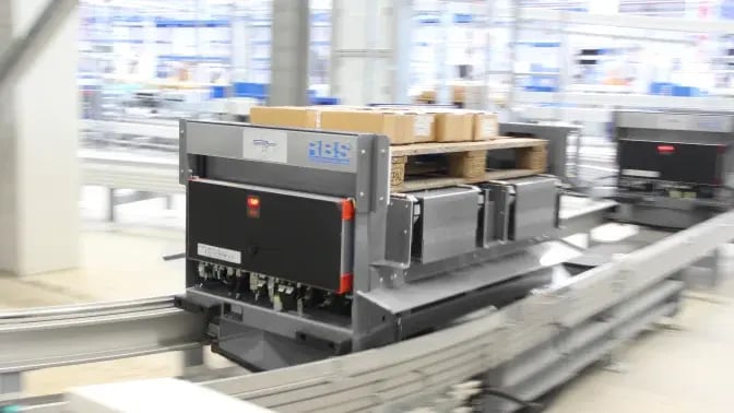 electric-floor-conveyor-672x378